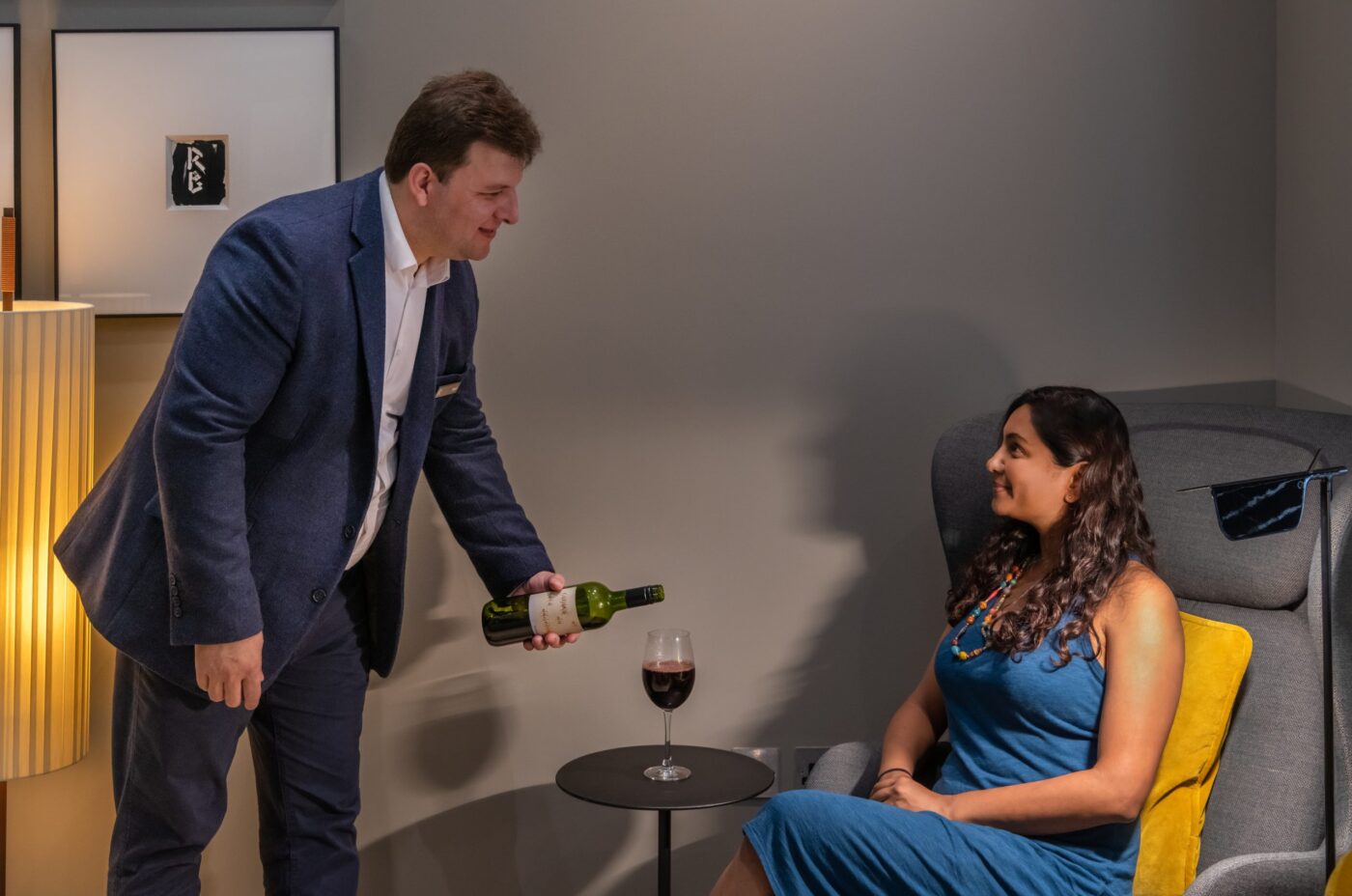 A customer being served an evening drink
