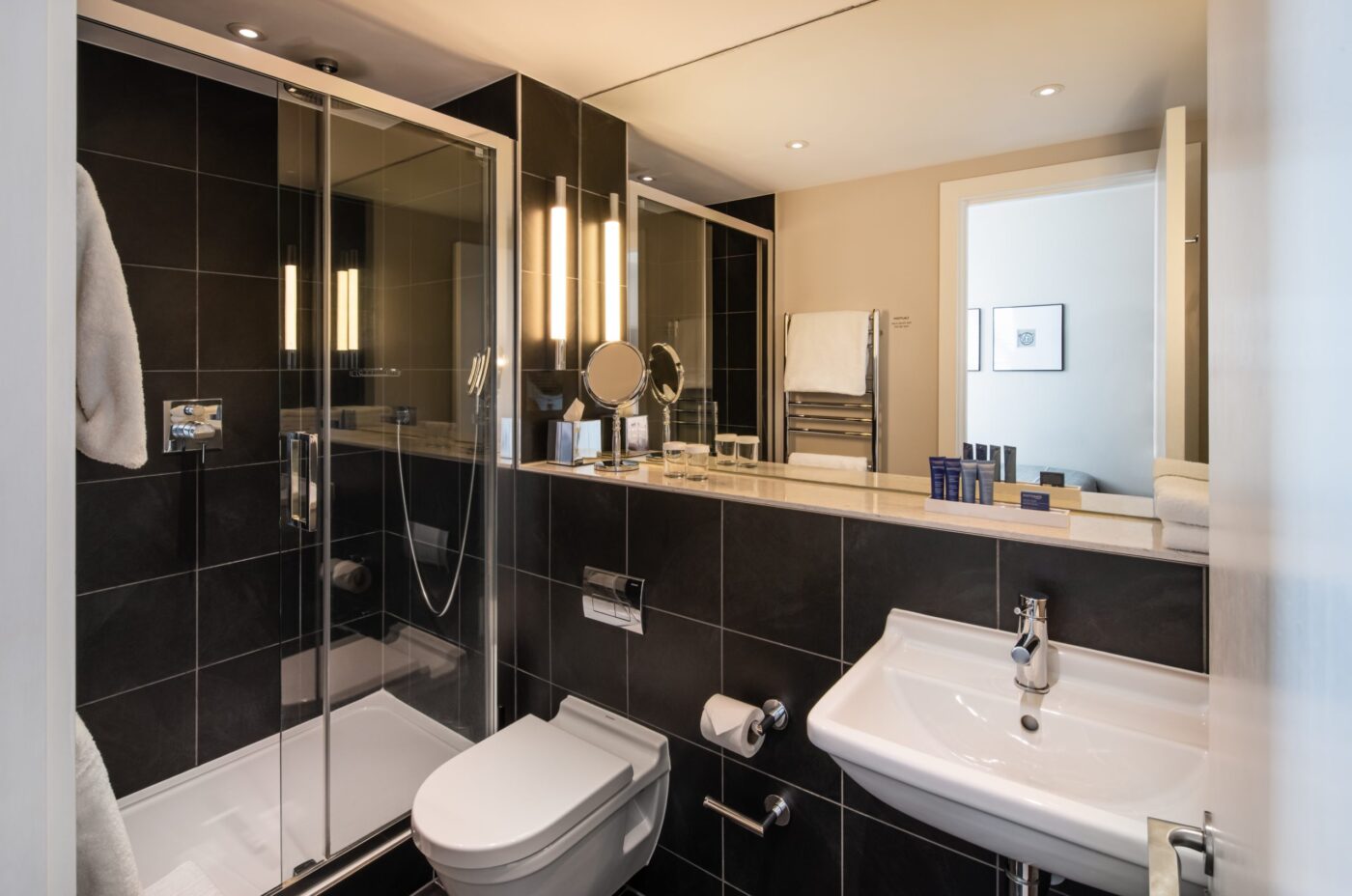 A small bathroom with a walk-in shower.