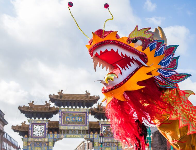 Chinese New Year celebrations with Dragon puppetry in Liverpool's Chinatown