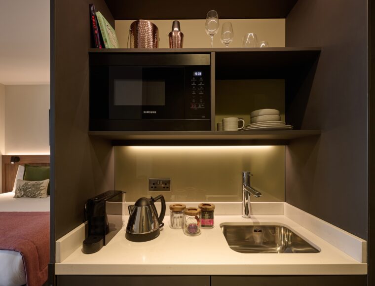 The Resident Edinburgh's mini-kitchen comprised of sink, mini-fridge, microwave and Nespresso Machine